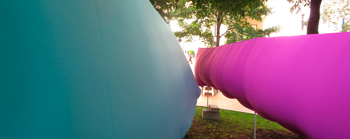 aqua and purple fabric tunnel inflated by the wind, Wharf District Parks, Boston