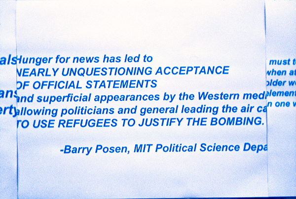War protest sheets with quote from MIT political science department