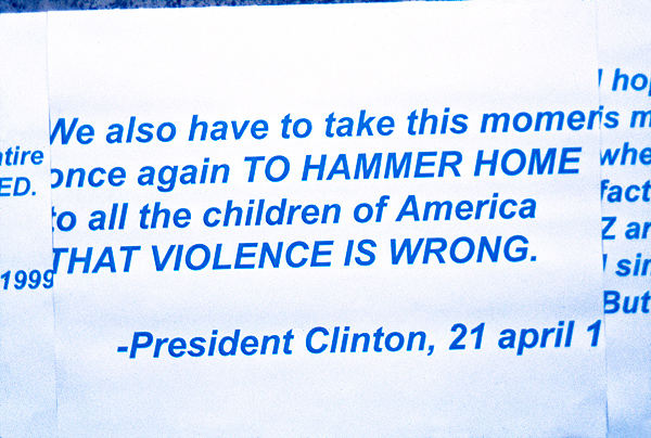 War protest sheet with quote from President Clinton