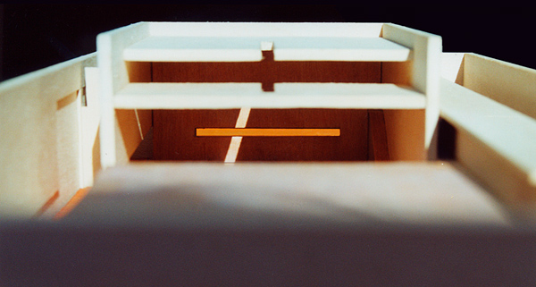 main chapel wood model showing light through roof slit forming cross against horizontal slit window, proposed cemetery across the US-Mexico border, Tijuana-San Diego