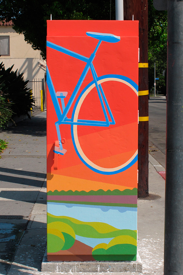 bike ride along the LA river with Long Beach Harbor cranes and sunset in the background mural on traffic box at Pacific Ave and Hill St, Wrigley Village, Long Beach, CA