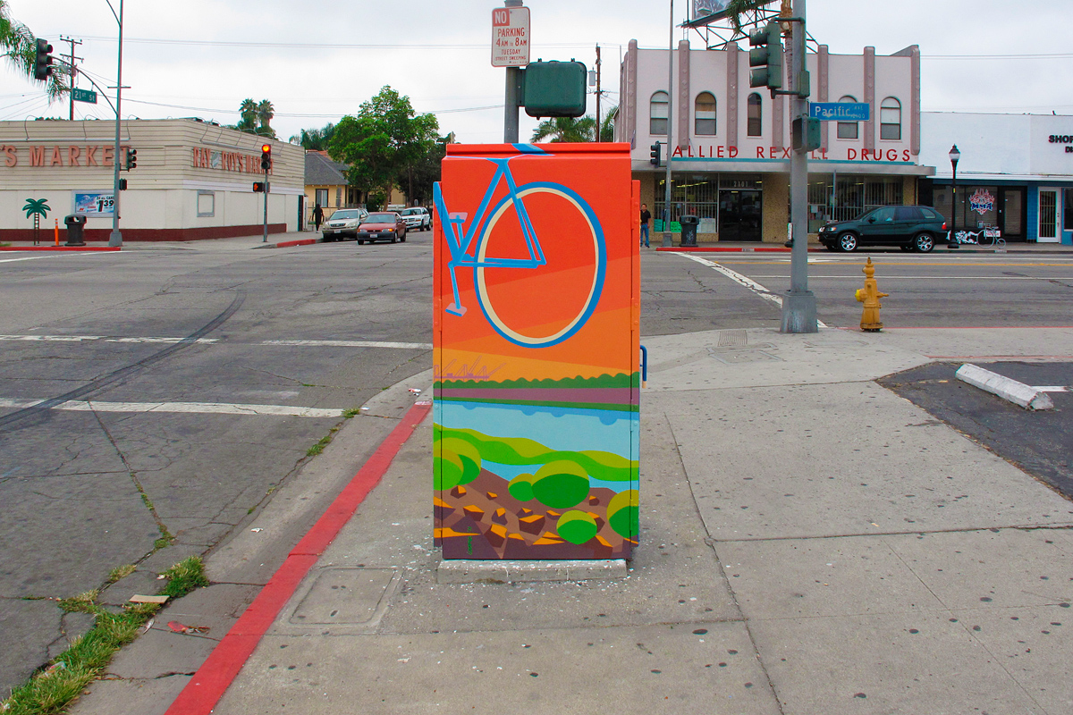 bike ride along the LA river with Long Beach Harbor cranes and sunset in the background mural on traffic box at Pacific Ave and 21st St, Wrigley Village, Long Beach, CA